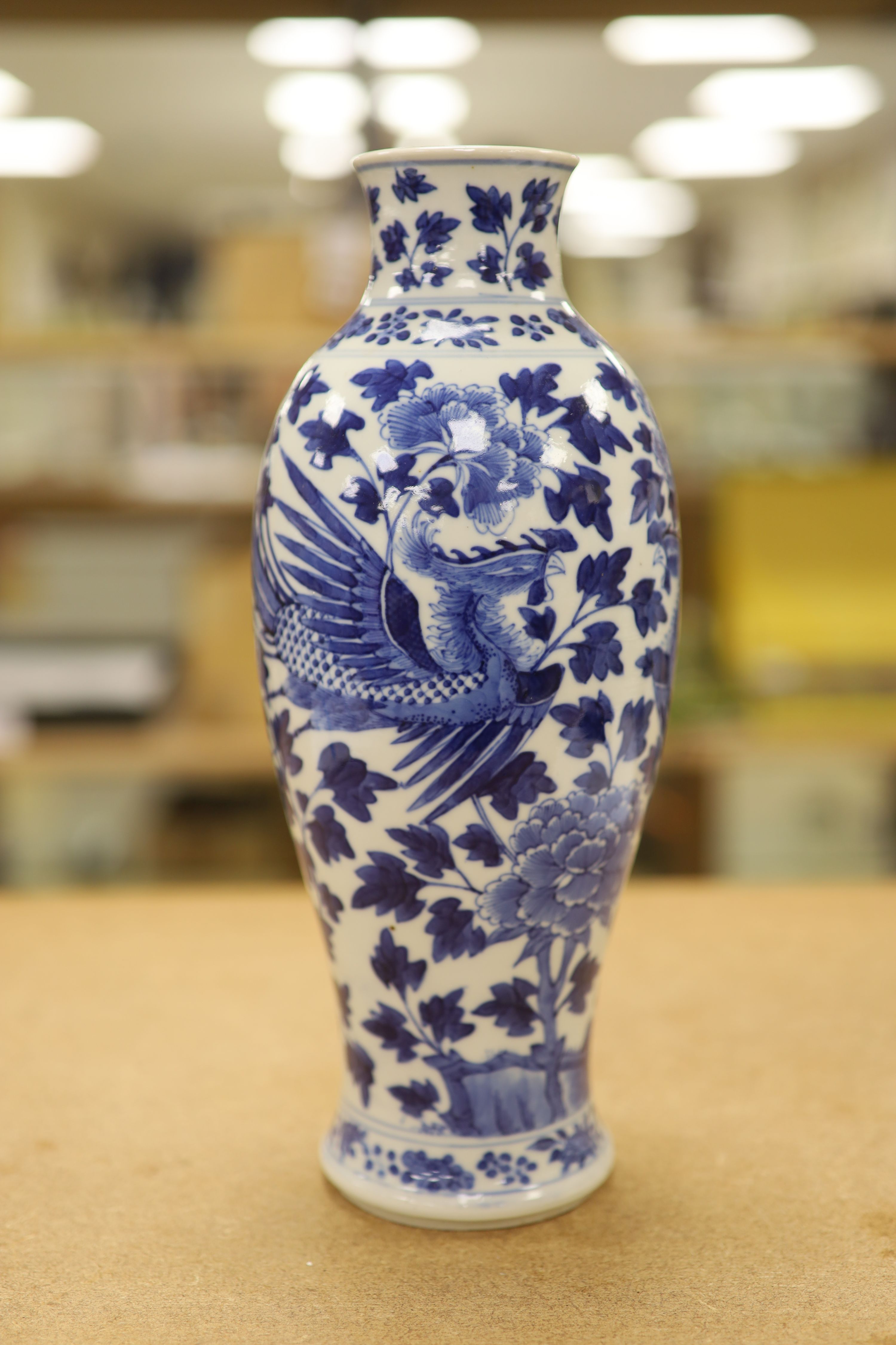 Two 19th century Chinese blue and white vases, decorated with phoenix, tallest 28cm (a.f)